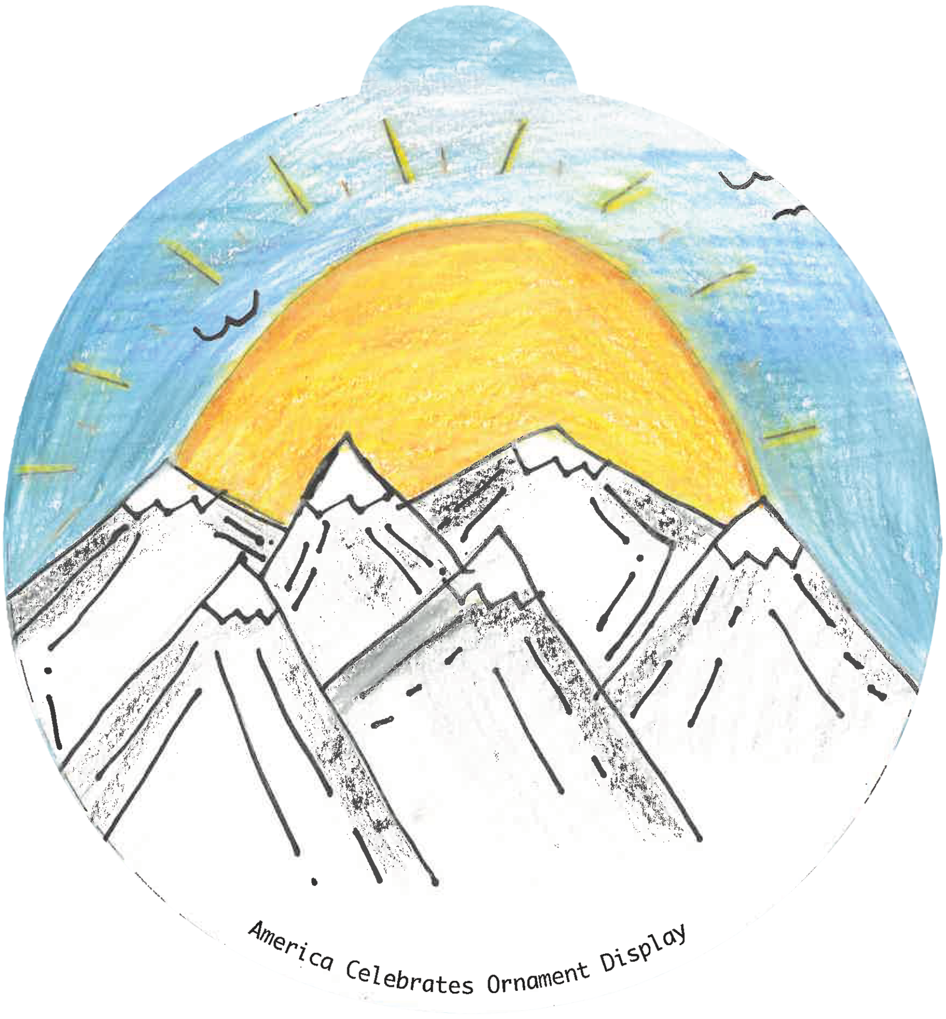 ornament depicting a sun rising over snow-capped mountains