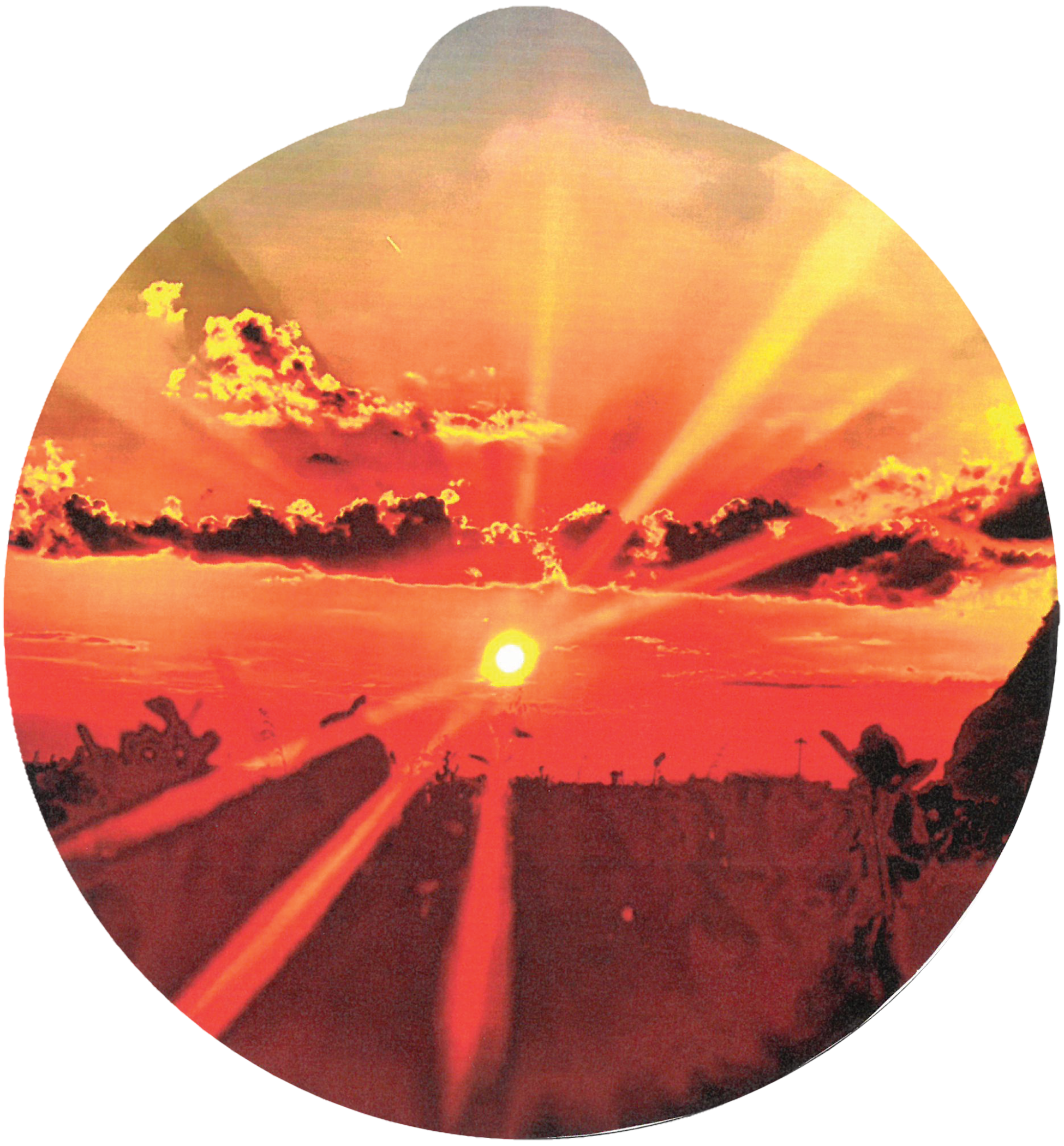ornament depicting a sunrise over a field